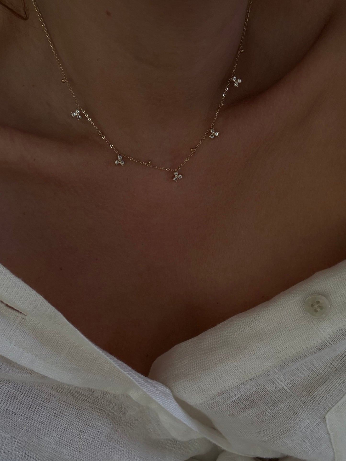 collier fin strass dore