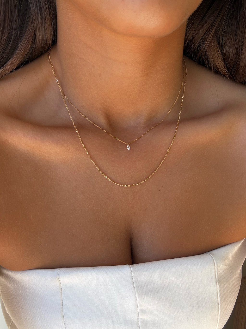 Collier Livia à strass en acier inoxydable doré – coloris Blanc – bijou Adalima