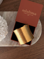 Manchette Assia en acier inoxydable doré – bijou Adalima