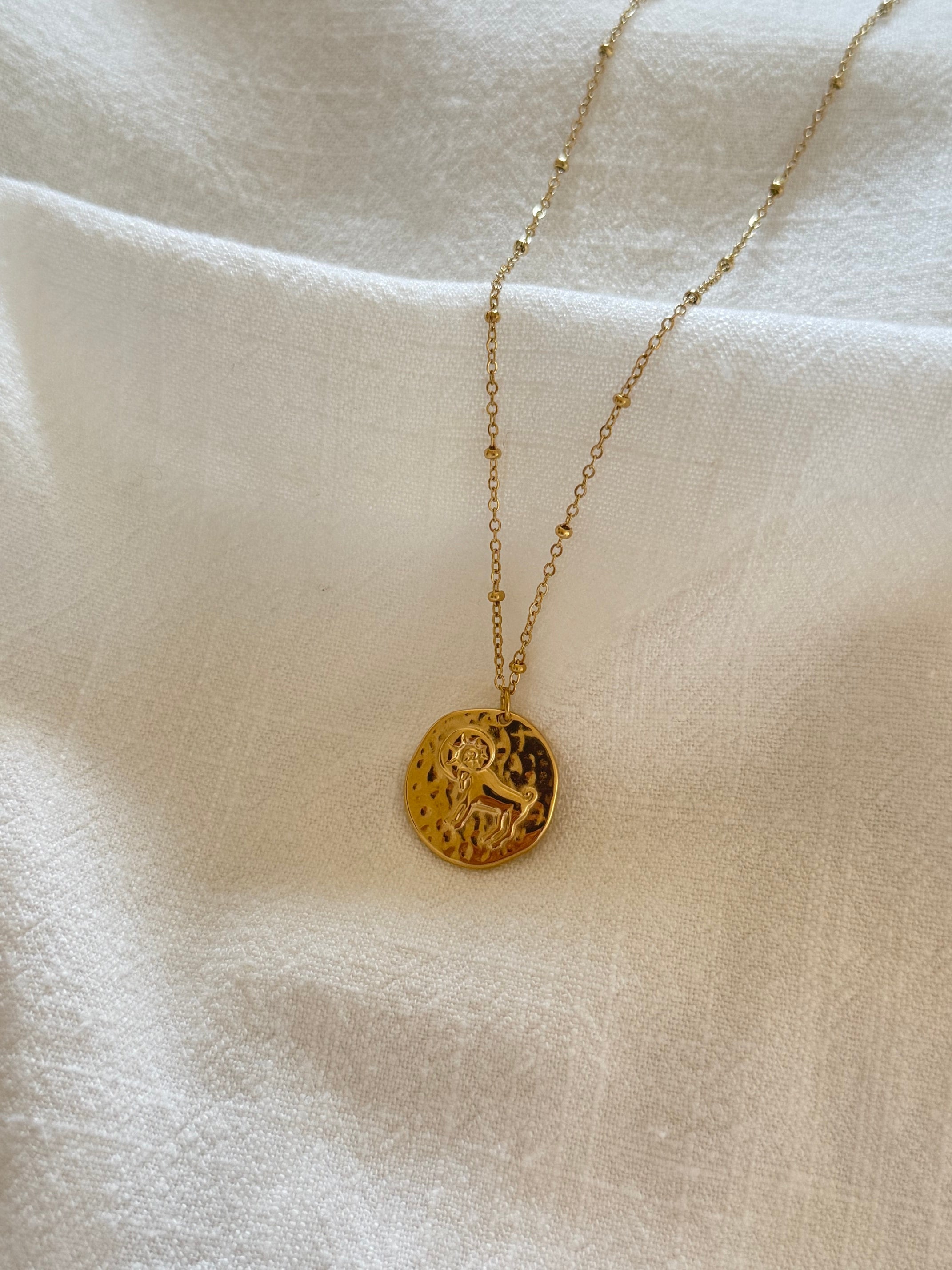 collier signe taureau 