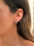 boucles d'oreilles en acier inoxydable argenté en forme de créoles serties de strass
