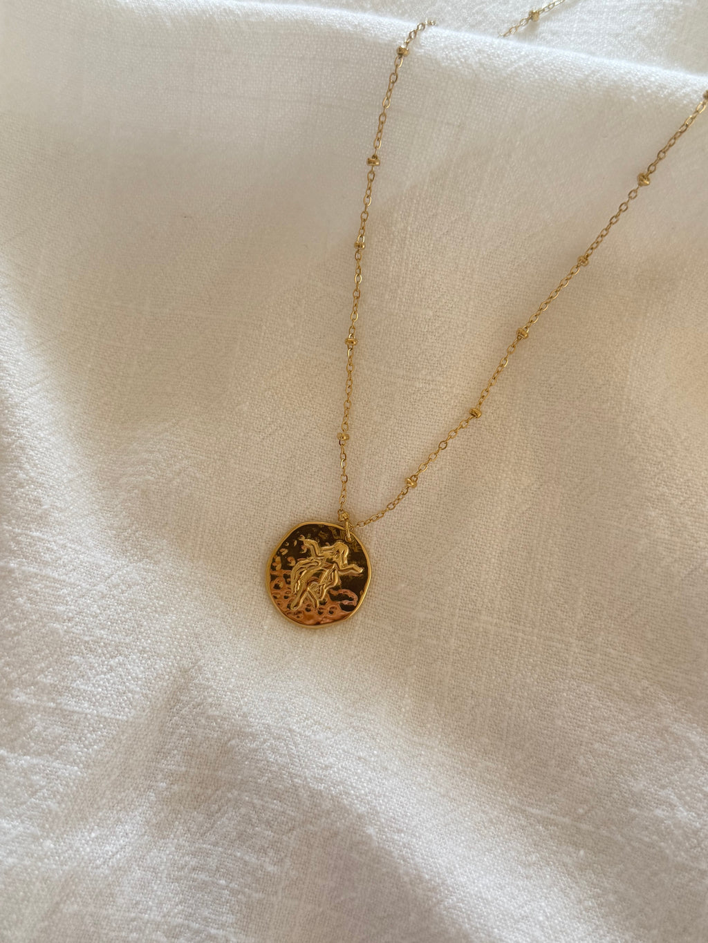 collier signe vierge